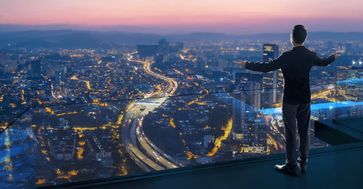 man standing on a balcony